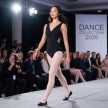 a model walks down the catwalk